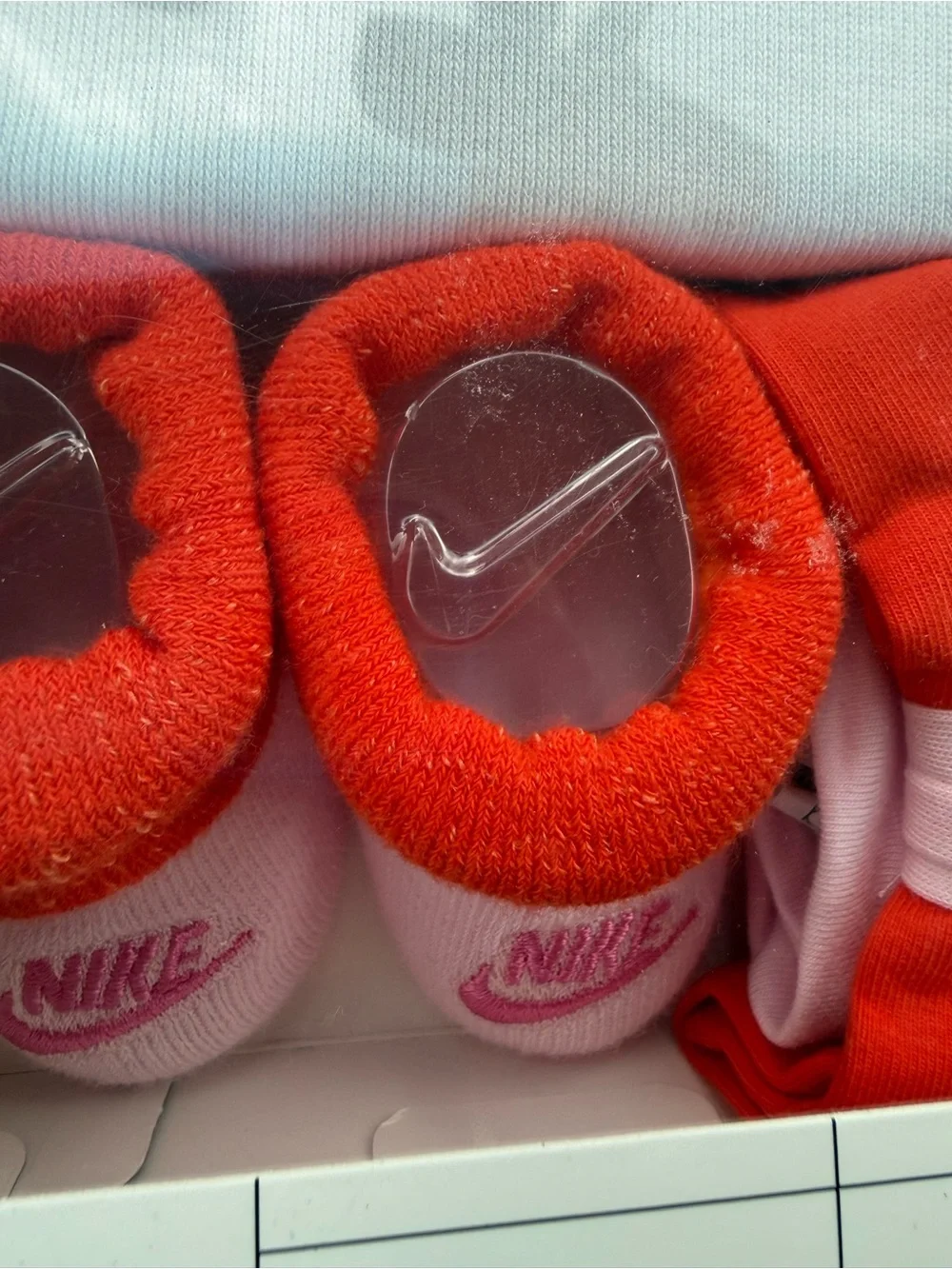 New girls Nike Baby 3-Piece Set in White and Red with Multicolor Icons